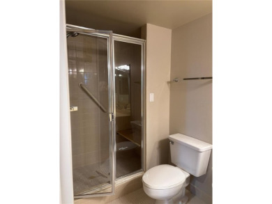 This spacious third-floor end unit offers true resort-type on Feather Sound Country Club in Florida - for sale on GolfHomes.com, golf home, golf lot