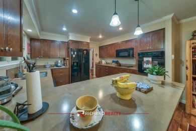 This low-maintenance 2-bedroom, 2-bath brick home offers on Olive Glenn Golf and Country Club in Wyoming - for sale on GolfHomes.com, golf home, golf lot