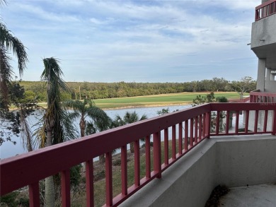 This spacious third-floor end unit offers true resort-type on Feather Sound Country Club in Florida - for sale on GolfHomes.com, golf home, golf lot