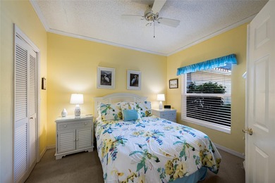 This beautifully maintained Mediterranean Carriage home on Palm Aire Country Club of Sarasota in Florida - for sale on GolfHomes.com, golf home, golf lot