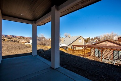 A stunning new home in Redlands Pinnacle Ridge Subdivision on The Golf Club At Redlands Mesa in Colorado - for sale on GolfHomes.com, golf home, golf lot