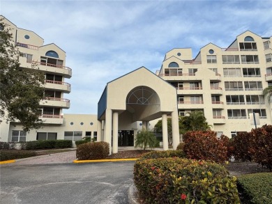 This spacious third-floor end unit offers true resort-type on Feather Sound Country Club in Florida - for sale on GolfHomes.com, golf home, golf lot