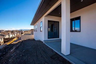 A stunning new home in Redlands Pinnacle Ridge Subdivision on The Golf Club At Redlands Mesa in Colorado - for sale on GolfHomes.com, golf home, golf lot