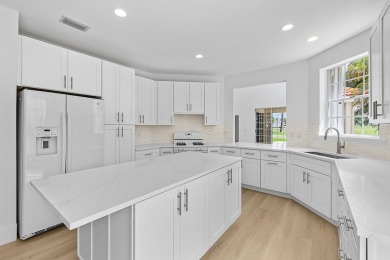 Beautifully updated & recently renovated home in the highly on PGA National Golf Club in Florida - for sale on GolfHomes.com, golf home, golf lot