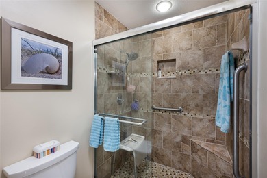 This beautifully maintained Mediterranean Carriage home on Palm Aire Country Club of Sarasota in Florida - for sale on GolfHomes.com, golf home, golf lot