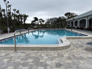 This spacious third-floor end unit offers true resort-type on Feather Sound Country Club in Florida - for sale on GolfHomes.com, golf home, golf lot