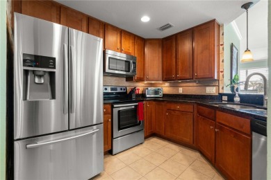 LUXURY LIVING IN A GATED COMPLEX WITHIN PGI! Move-in ready, 2 on Saint Andrews South Golf Club in Florida - for sale on GolfHomes.com, golf home, golf lot