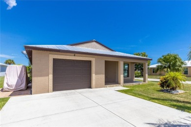 Clean. Crisp. Carefree. This 2020 CBS home has been so lightly on Spanish Lakes Country Club in Florida - for sale on GolfHomes.com, golf home, golf lot
