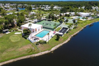 Clean. Crisp. Carefree. This 2020 CBS home has been so lightly on Spanish Lakes Country Club in Florida - for sale on GolfHomes.com, golf home, golf lot