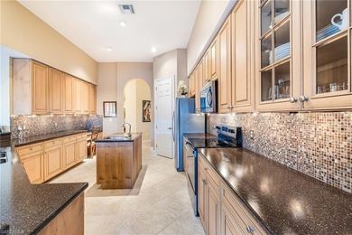 Sun-soaked pool days, long lake views, and a front-row backdrop on Copperleaf Golf Club in Florida - for sale on GolfHomes.com, golf home, golf lot