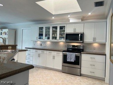 REDUCED! Walk in and COOL down with your brand-new air on Hibiscus Golf Club in Florida - for sale on GolfHomes.com, golf home, golf lot