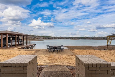 Lakefront living shines at this all-brick home on beautiful Lake on Ponce De Leon Golf Course in Arkansas - for sale on GolfHomes.com, golf home, golf lot