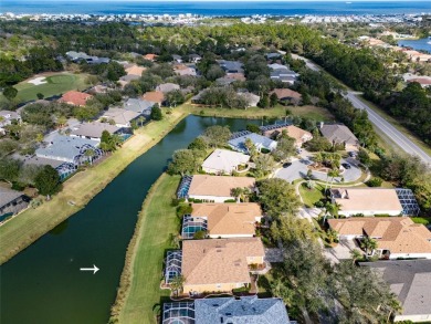 Step into your dream oasis at 99 Southlake Drive, Palm Coast on Grand Haven Golf Club in Florida - for sale on GolfHomes.com, golf home, golf lot