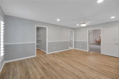 Welcome to this beautifully expanded Gardenia model in Sunset on The Links of Spruce Creek in Florida - for sale on GolfHomes.com, golf home, golf lot