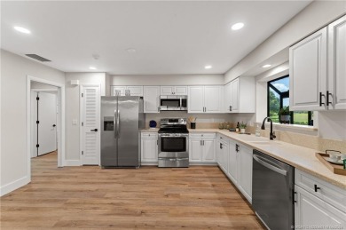 Step into luxury and style in this completely remodeled on Martin Downs Country Club in Florida - for sale on GolfHomes.com, golf home, golf lot
