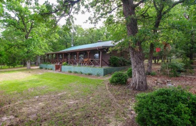 Nestled in the heart of the highly sought-after Holly Lake Ranch on Holly Lake Ranch Golf Club in Texas - for sale on GolfHomes.com, golf home, golf lot