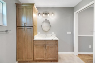 Welcome to this beautifully expanded Gardenia model in Sunset on The Links of Spruce Creek in Florida - for sale on GolfHomes.com, golf home, golf lot