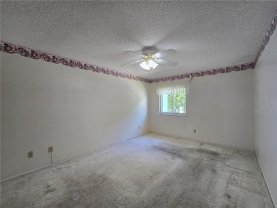 2nd floor condo located in the 55+ community of Live Oak Village on Country Club At Silver Springs Shores in Florida - for sale on GolfHomes.com, golf home, golf lot