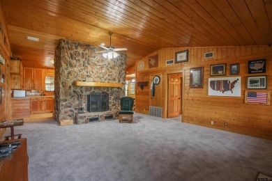Nestled in the heart of the highly sought-after Holly Lake Ranch on Holly Lake Ranch Golf Club in Texas - for sale on GolfHomes.com, golf home, golf lot
