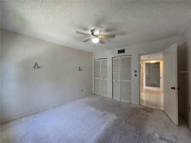 2nd floor condo located in the 55+ community of Live Oak Village on Country Club At Silver Springs Shores in Florida - for sale on GolfHomes.com, golf home, golf lot