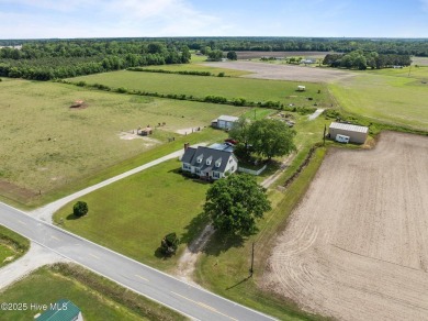 Welcome to your dream homestead! Nestled just moments from the on Cutter Creek Golf Club in North Carolina - for sale on GolfHomes.com, golf home, golf lot