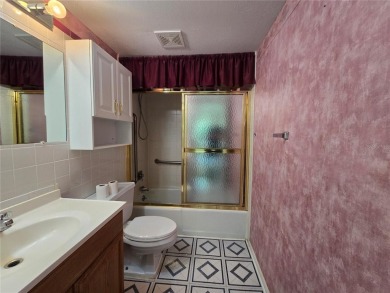 2nd floor condo located in the 55+ community of Live Oak Village on Country Club At Silver Springs Shores in Florida - for sale on GolfHomes.com, golf home, golf lot