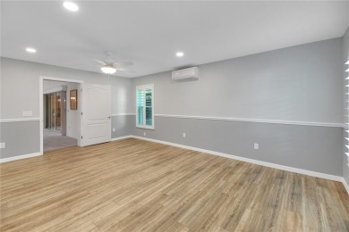 Welcome to this beautifully expanded Gardenia model in Sunset on The Links of Spruce Creek in Florida - for sale on GolfHomes.com, golf home, golf lot