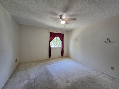 2nd floor condo located in the 55+ community of Live Oak Village on Country Club At Silver Springs Shores in Florida - for sale on GolfHomes.com, golf home, golf lot