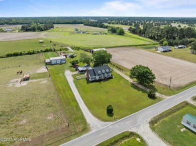 Welcome to your dream homestead! Nestled just moments from the on Cutter Creek Golf Club in North Carolina - for sale on GolfHomes.com, golf home, golf lot
