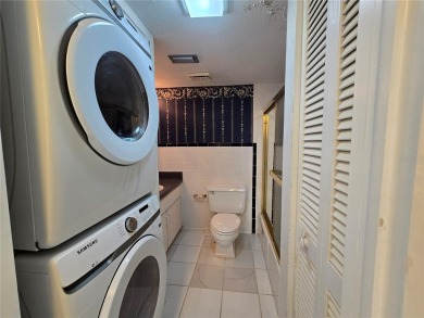 2nd floor condo located in the 55+ community of Live Oak Village on Country Club At Silver Springs Shores in Florida - for sale on GolfHomes.com, golf home, golf lot