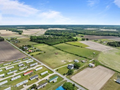 Welcome to your dream homestead! Nestled just moments from the on Cutter Creek Golf Club in North Carolina - for sale on GolfHomes.com, golf home, golf lot