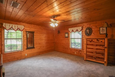 Nestled in the heart of the highly sought-after Holly Lake Ranch on Holly Lake Ranch Golf Club in Texas - for sale on GolfHomes.com, golf home, golf lot