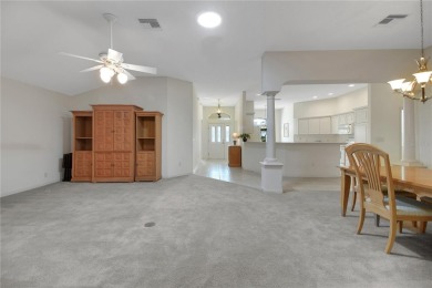 Welcome to this beautifully expanded Gardenia model in Sunset on The Links of Spruce Creek in Florida - for sale on GolfHomes.com, golf home, golf lot