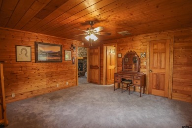 Nestled in the heart of the highly sought-after Holly Lake Ranch on Holly Lake Ranch Golf Club in Texas - for sale on GolfHomes.com, golf home, golf lot