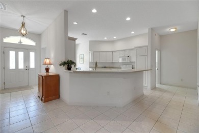 Welcome to this beautifully expanded Gardenia model in Sunset on The Links of Spruce Creek in Florida - for sale on GolfHomes.com, golf home, golf lot