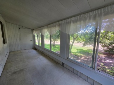 2nd floor condo located in the 55+ community of Live Oak Village on Country Club At Silver Springs Shores in Florida - for sale on GolfHomes.com, golf home, golf lot