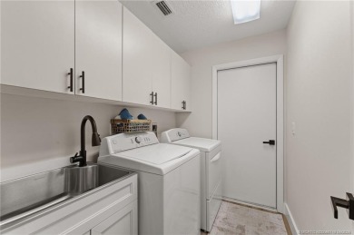 Step into luxury and style in this completely remodeled on Martin Downs Country Club in Florida - for sale on GolfHomes.com, golf home, golf lot