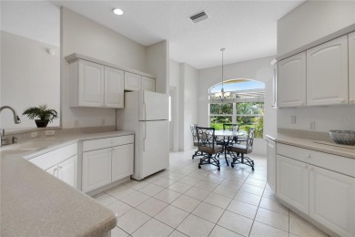 Welcome to this beautifully expanded Gardenia model in Sunset on The Links of Spruce Creek in Florida - for sale on GolfHomes.com, golf home, golf lot