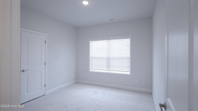Photos are of a similar home in same community! The 1709 plan on Lennon Hills Golf Course in North Carolina - for sale on GolfHomes.com, golf home, golf lot