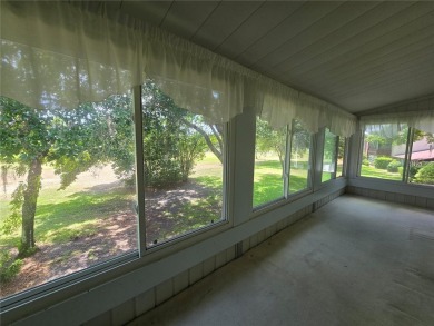 2nd floor condo located in the 55+ community of Live Oak Village on Country Club At Silver Springs Shores in Florida - for sale on GolfHomes.com, golf home, golf lot