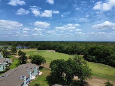2nd floor condo located in the 55+ community of Live Oak Village on Country Club At Silver Springs Shores in Florida - for sale on GolfHomes.com, golf home, golf lot