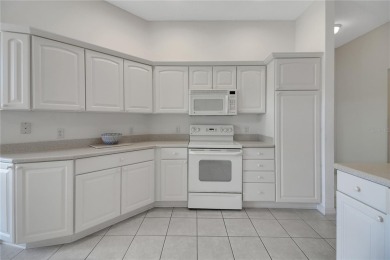 Welcome to this beautifully expanded Gardenia model in Sunset on The Links of Spruce Creek in Florida - for sale on GolfHomes.com, golf home, golf lot