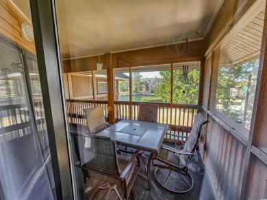 Beautiful lake view from this large screened-in porch that has on Arcadian Shores Golf Club in South Carolina - for sale on GolfHomes.com, golf home, golf lot