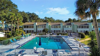 2nd floor condo located in the 55+ community of Live Oak Village on Country Club At Silver Springs Shores in Florida - for sale on GolfHomes.com, golf home, golf lot