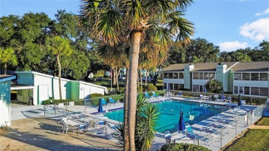 2nd floor condo located in the 55+ community of Live Oak Village on Country Club At Silver Springs Shores in Florida - for sale on GolfHomes.com, golf home, golf lot