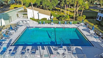 2nd floor condo located in the 55+ community of Live Oak Village on Country Club At Silver Springs Shores in Florida - for sale on GolfHomes.com, golf home, golf lot