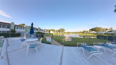 2nd floor condo located in the 55+ community of Live Oak Village on Country Club At Silver Springs Shores in Florida - for sale on GolfHomes.com, golf home, golf lot