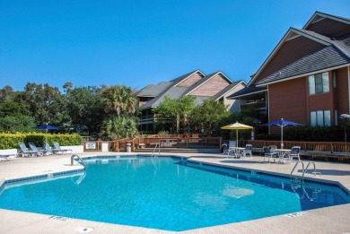 Beautiful lake view from this large screened-in porch that has on Arcadian Shores Golf Club in South Carolina - for sale on GolfHomes.com, golf home, golf lot