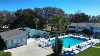 2nd floor condo located in the 55+ community of Live Oak Village on Country Club At Silver Springs Shores in Florida - for sale on GolfHomes.com, golf home, golf lot