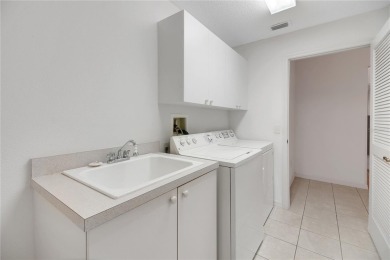 Welcome to this beautifully expanded Gardenia model in Sunset on The Links of Spruce Creek in Florida - for sale on GolfHomes.com, golf home, golf lot